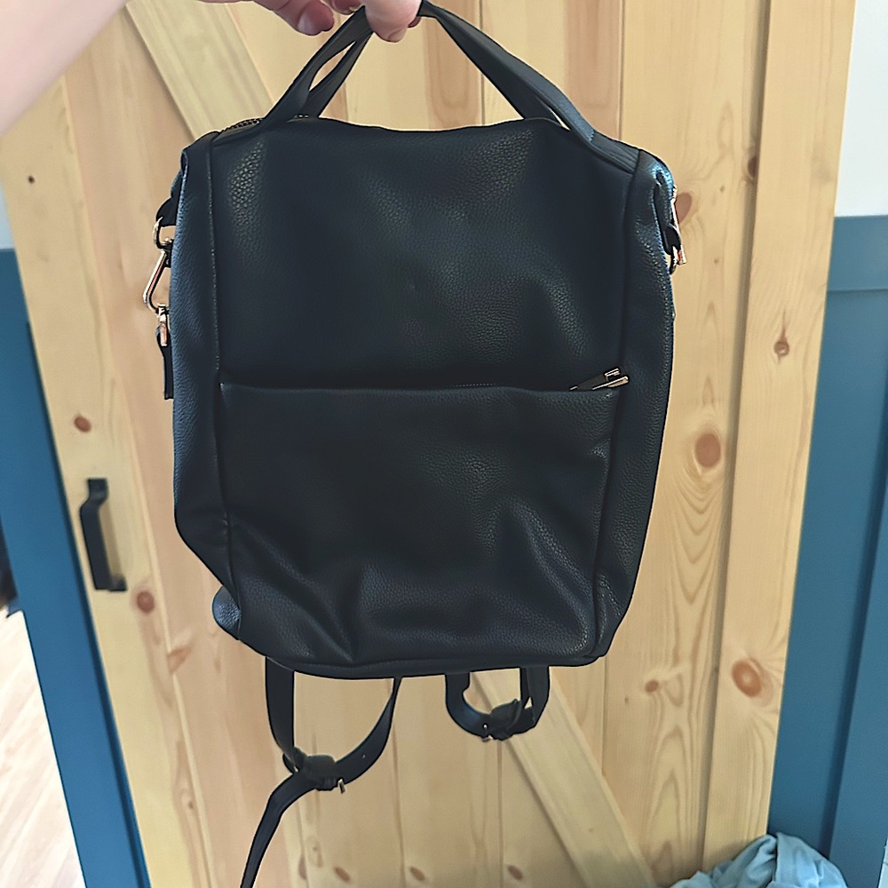 A New Day Square Backpack